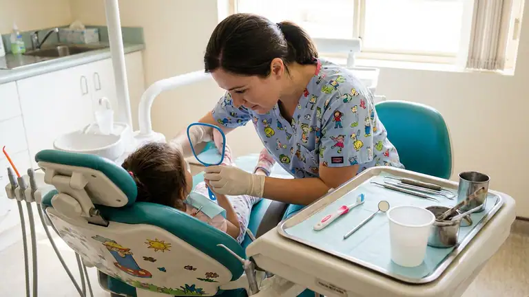 Why Children's doctor : dentist Makes Dental Care Feel Like Play header